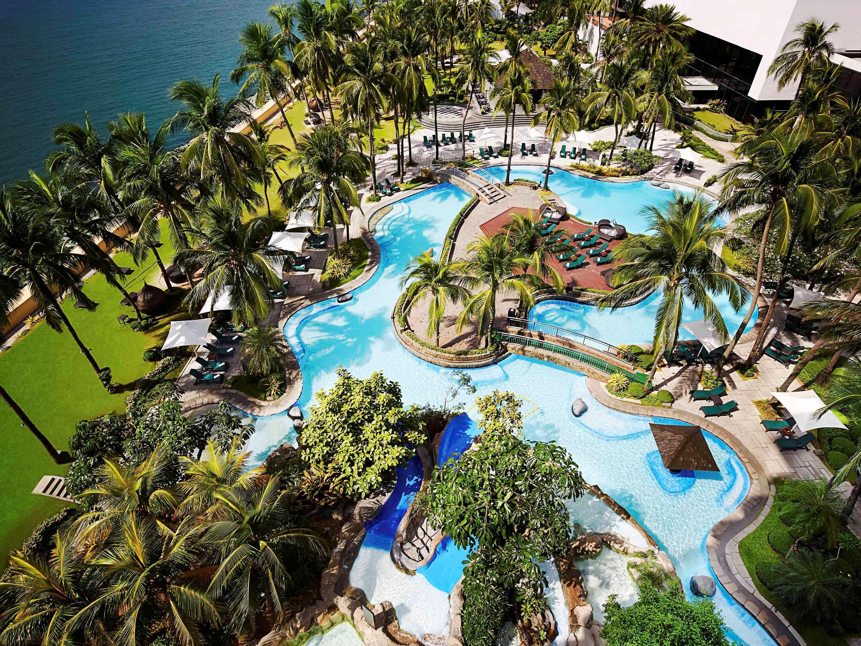 Sofitel Philippine Plaza Manila Hotel Pasay Exterior photo The pool at the Royal Beach Club